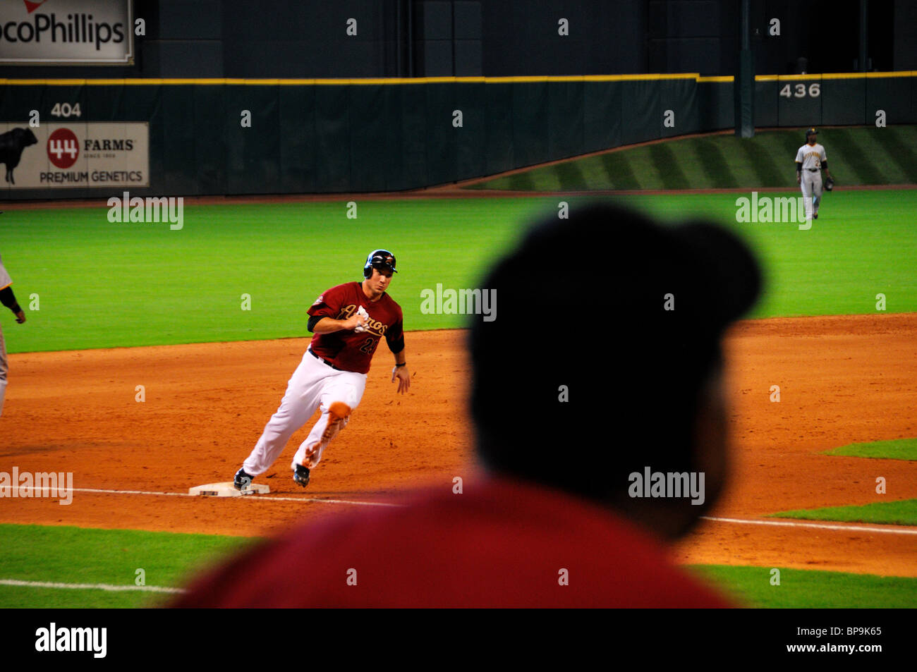 An Astro player running home from third base. Houston, Texas, USA. Stock Photo