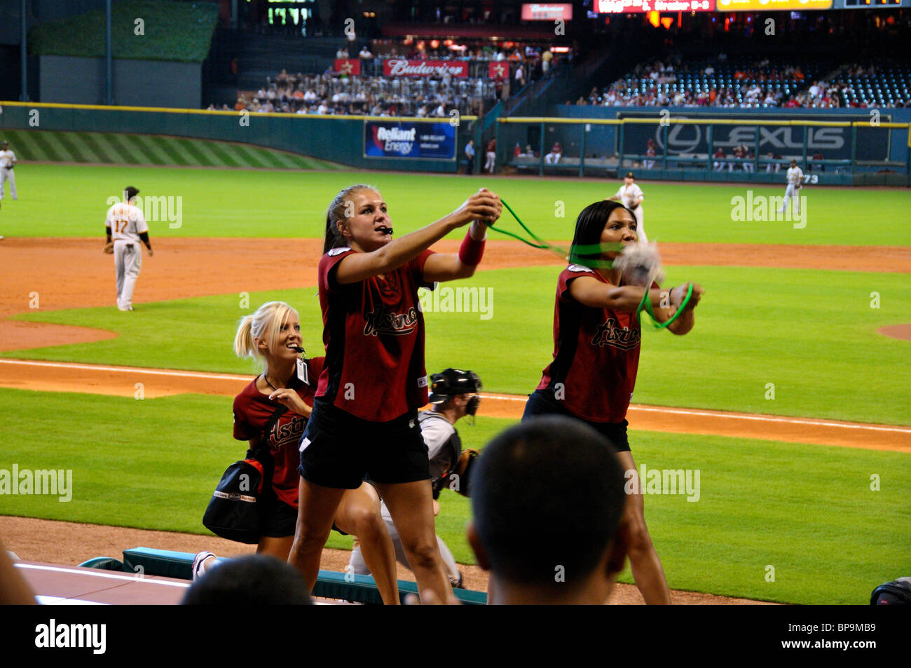 Young ladies entertain the crowd at baseball game. Houston, Texas, USA. Stock Photo