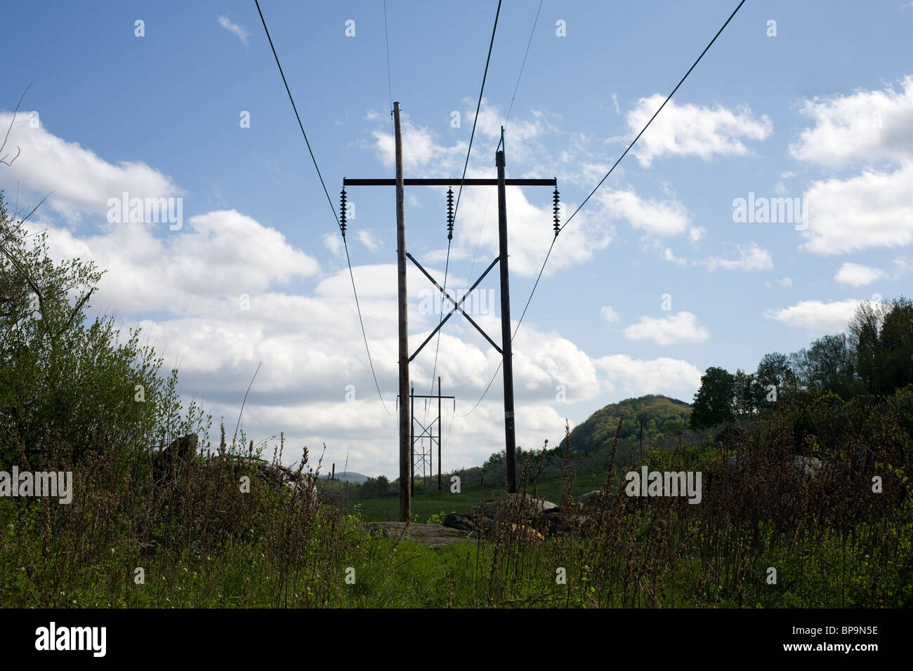 Power lines run through the countryside in the Berkshires of Massachusetts. Stock Photo