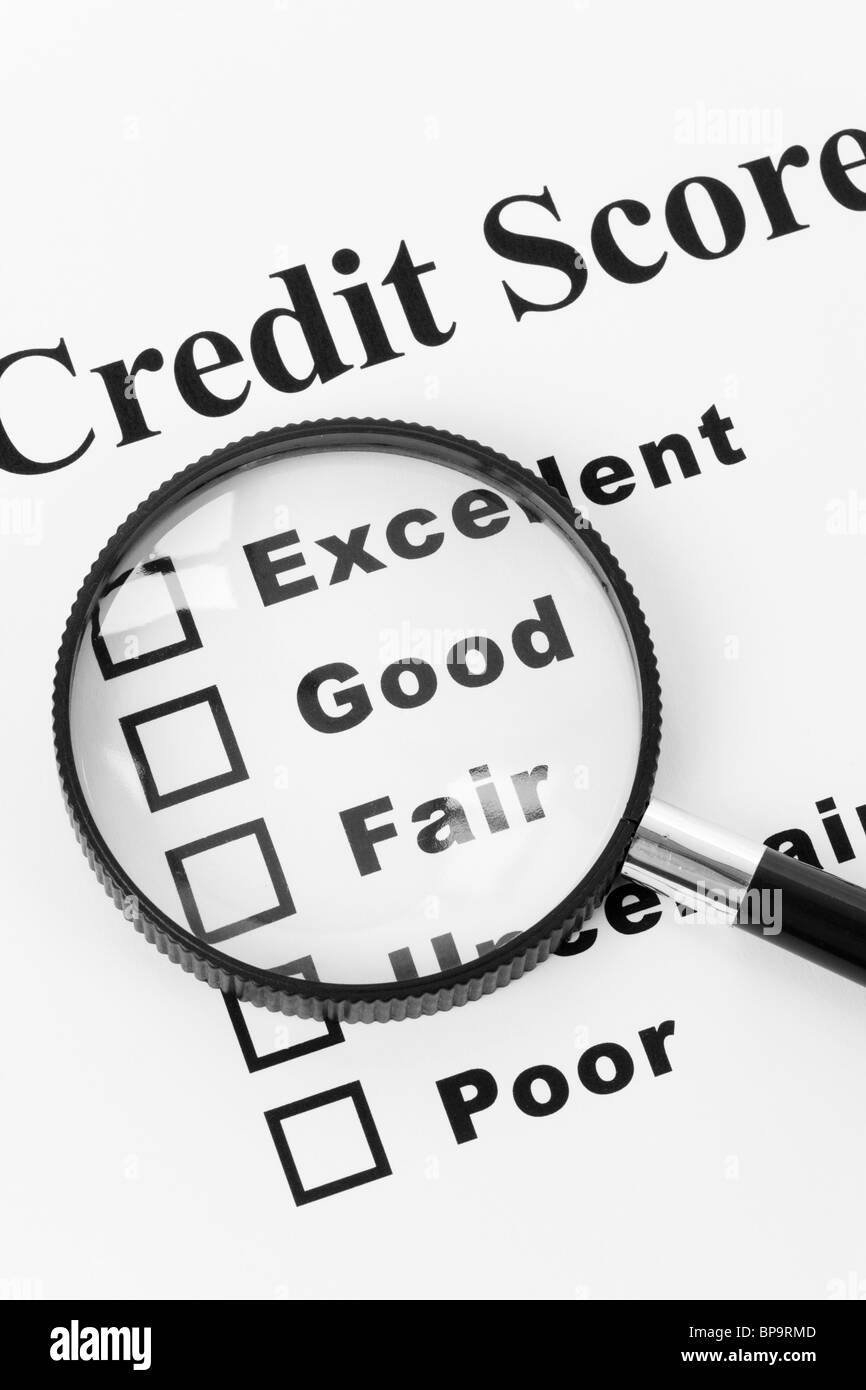 Credit Score and Magnifying Glass Stock Photo