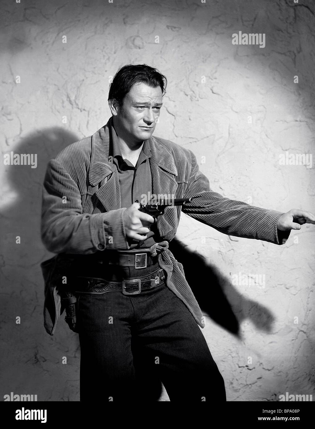 JOHN WAYNE THE SPOILERS (1942) Stock Photo