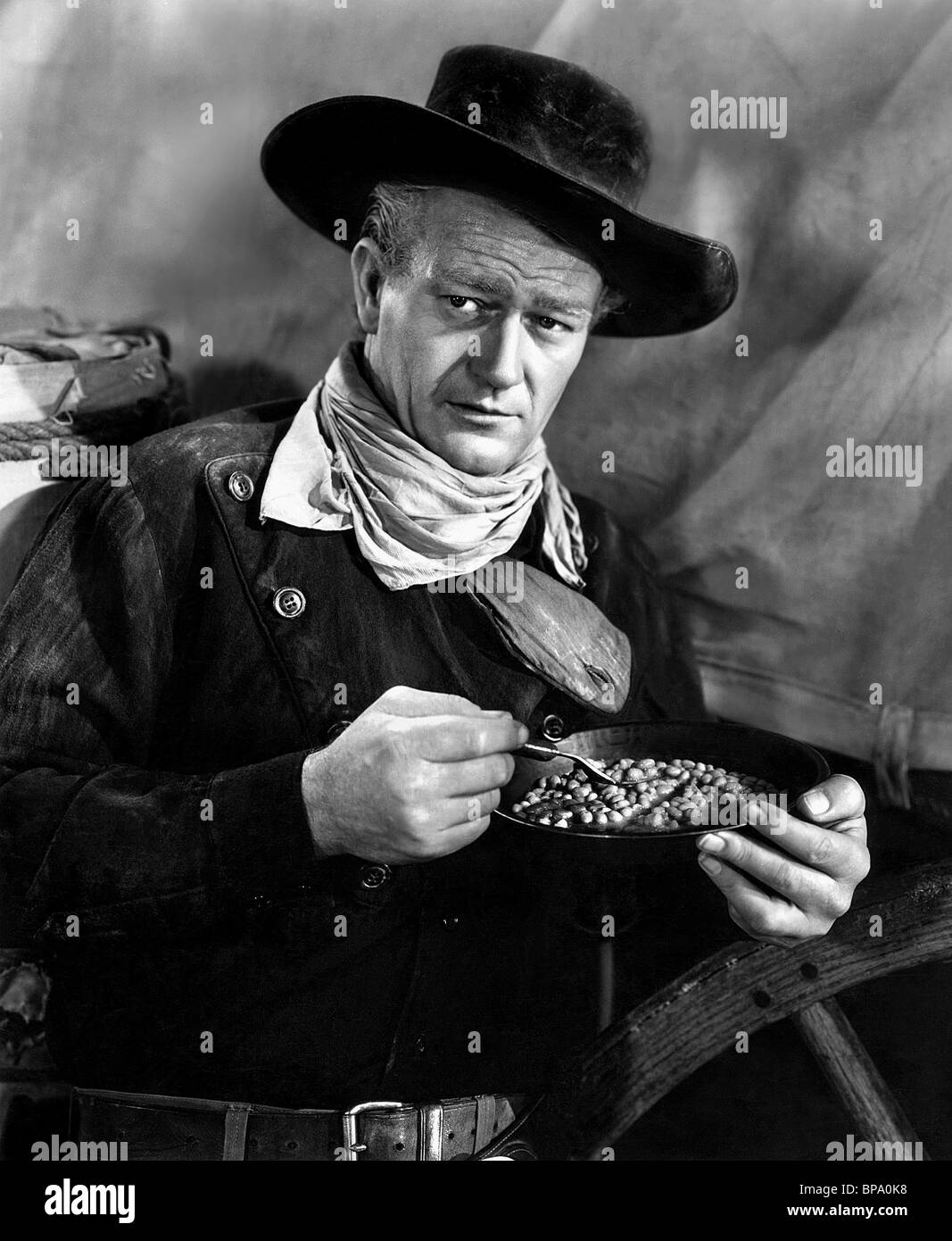 Movies western john wayne cinema film Black and White Stock Photos