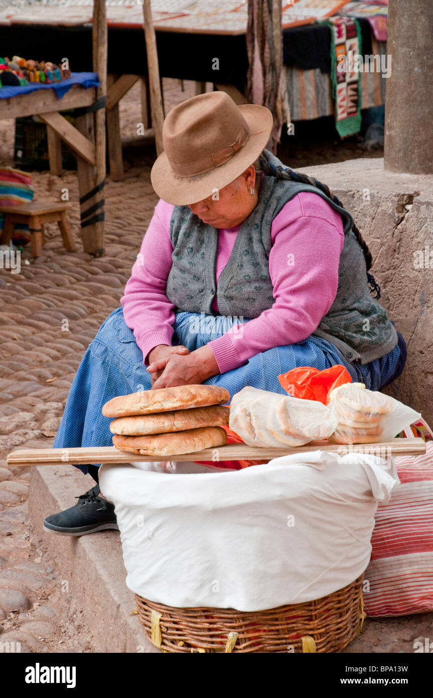 A Peruvian lady in traditional dress in the market in Pisac, Urubamba Valley, Peru, South America. Stock Photo