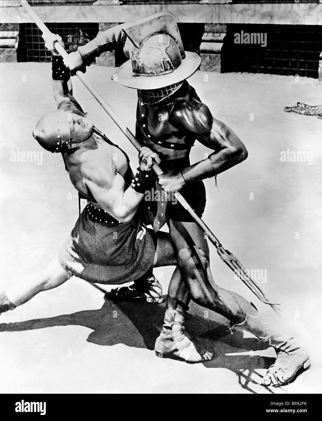 [IMAGE:https://c8.alamy.com/comp/BPA2FK/gladiators-fight-scene-demetrius-and-the-gladiators-1954-BPA2FK.jpg]