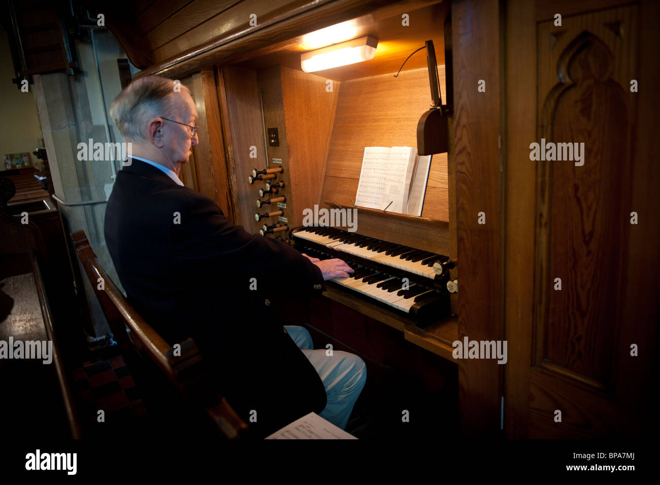 Church organist playing at a wedding service, UK some are accused of