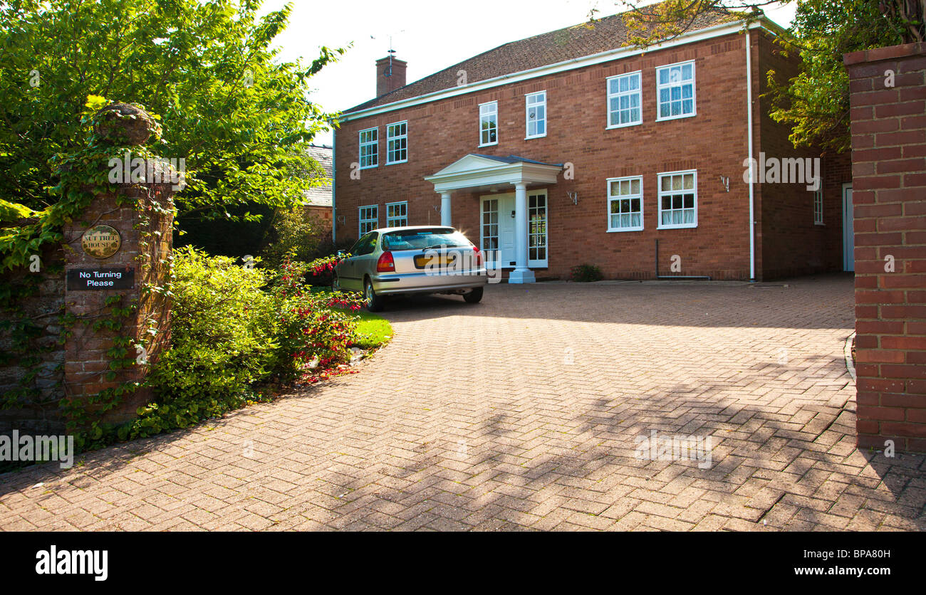 Large Georgian country house in the Wiltshire village of Wanborough, England, UK Stock Photo