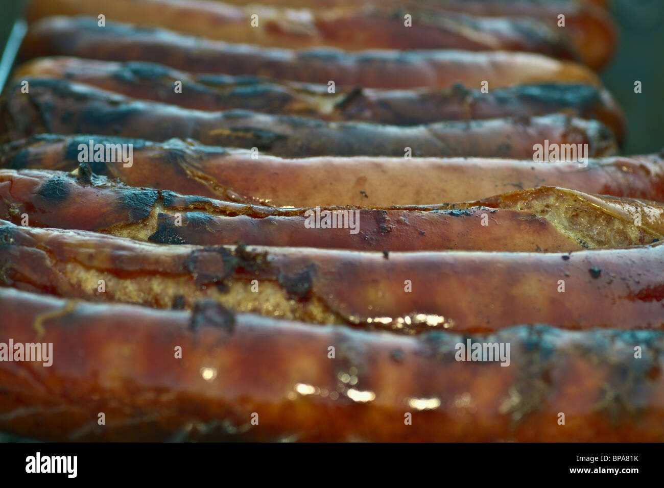 sausages on grill. narrow focus, bokeh (sdof). Horizontal Stock Photo