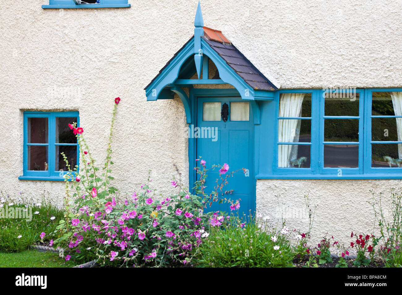 A whitewashed pebbledash country cottage in the Wiltshire village of Wanborough, England, UK Stock Photo