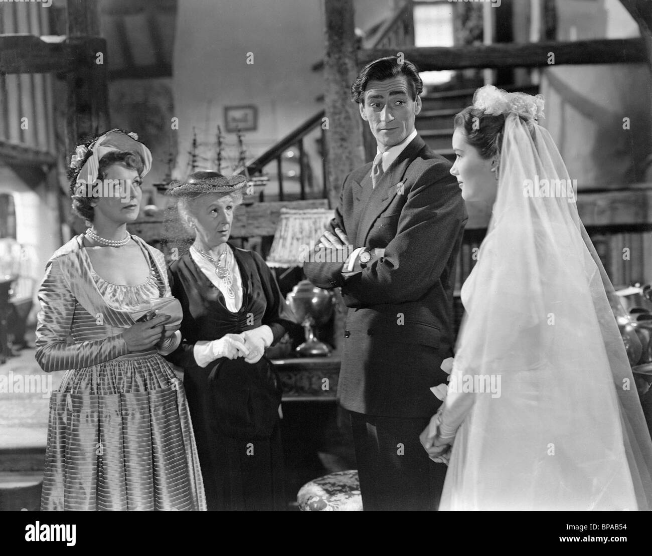 SCENE WITH NORA SWINBURNE, GUY ROLFE, SALLY ANN HOWES, FOOLS RUSH IN, 1949 Stock Photo