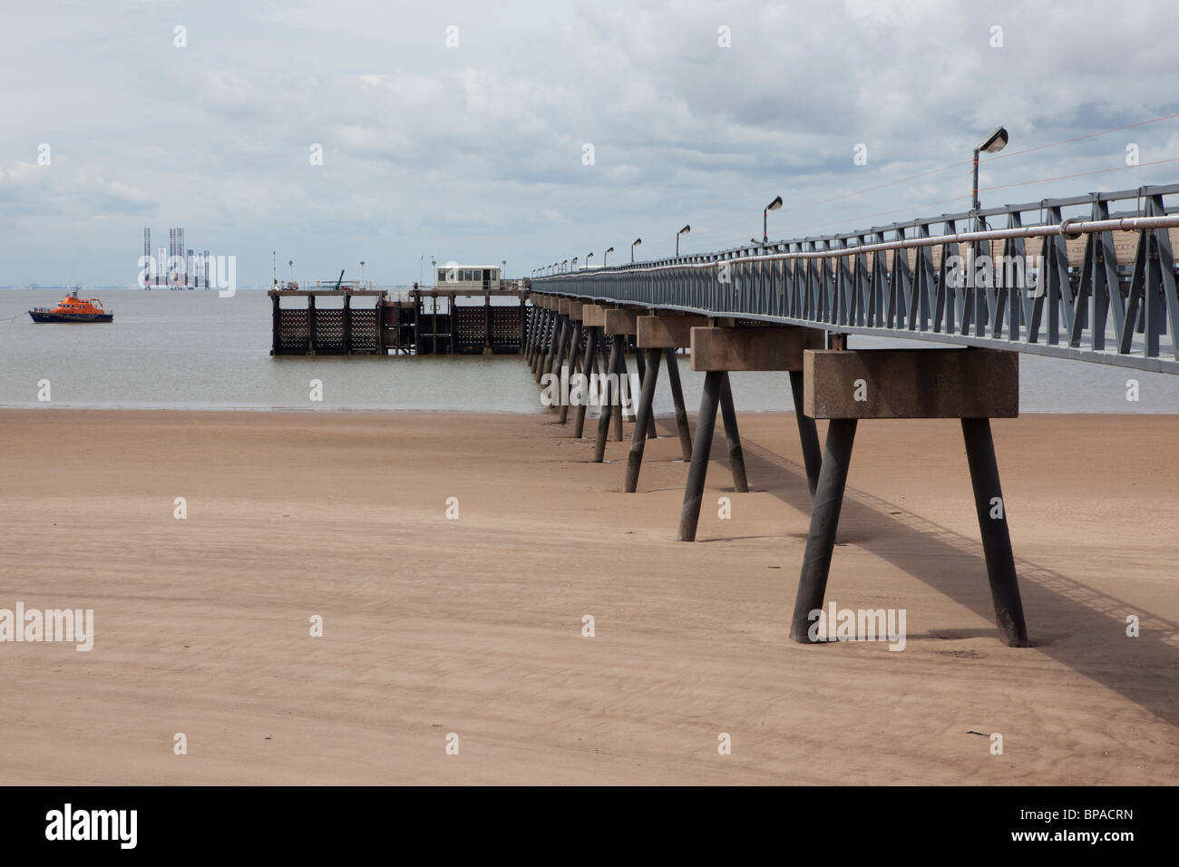 The walkway from the pilot station to the boat moorings on the Humber Estuary in East Yorkshire. Stock Photo