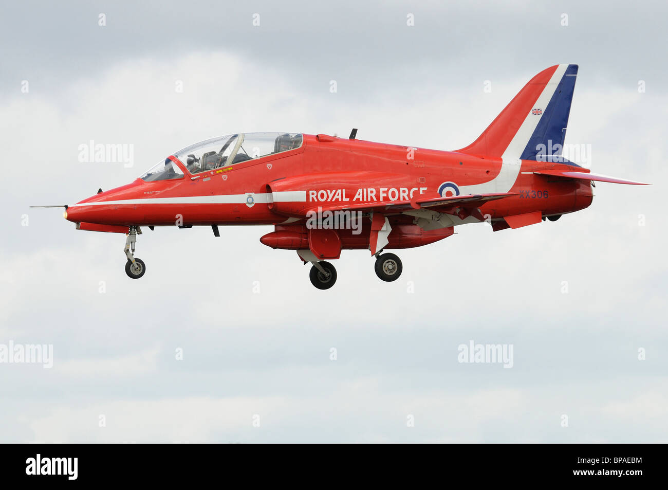 British Royal Air Force Hawk T1A Jet trainer XX306 of the Red Arrows Aerobatic Display Team comes in to land at RAF Fairford Stock Photo