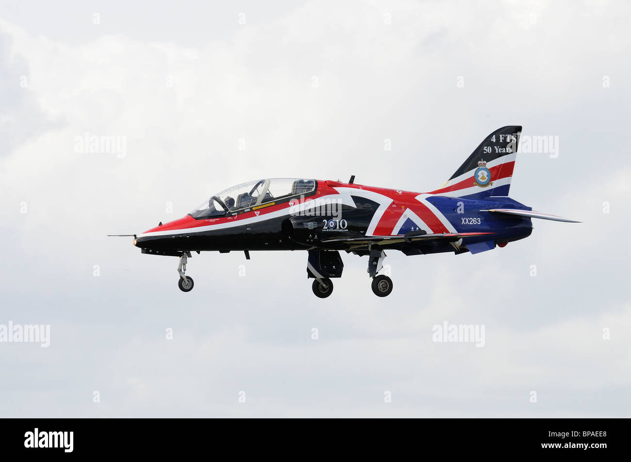 British Aerospace Hawk T.1 jet trainer XX263 operated by the Royal Air Force with its striking paint job, on final approach at t Stock Photo