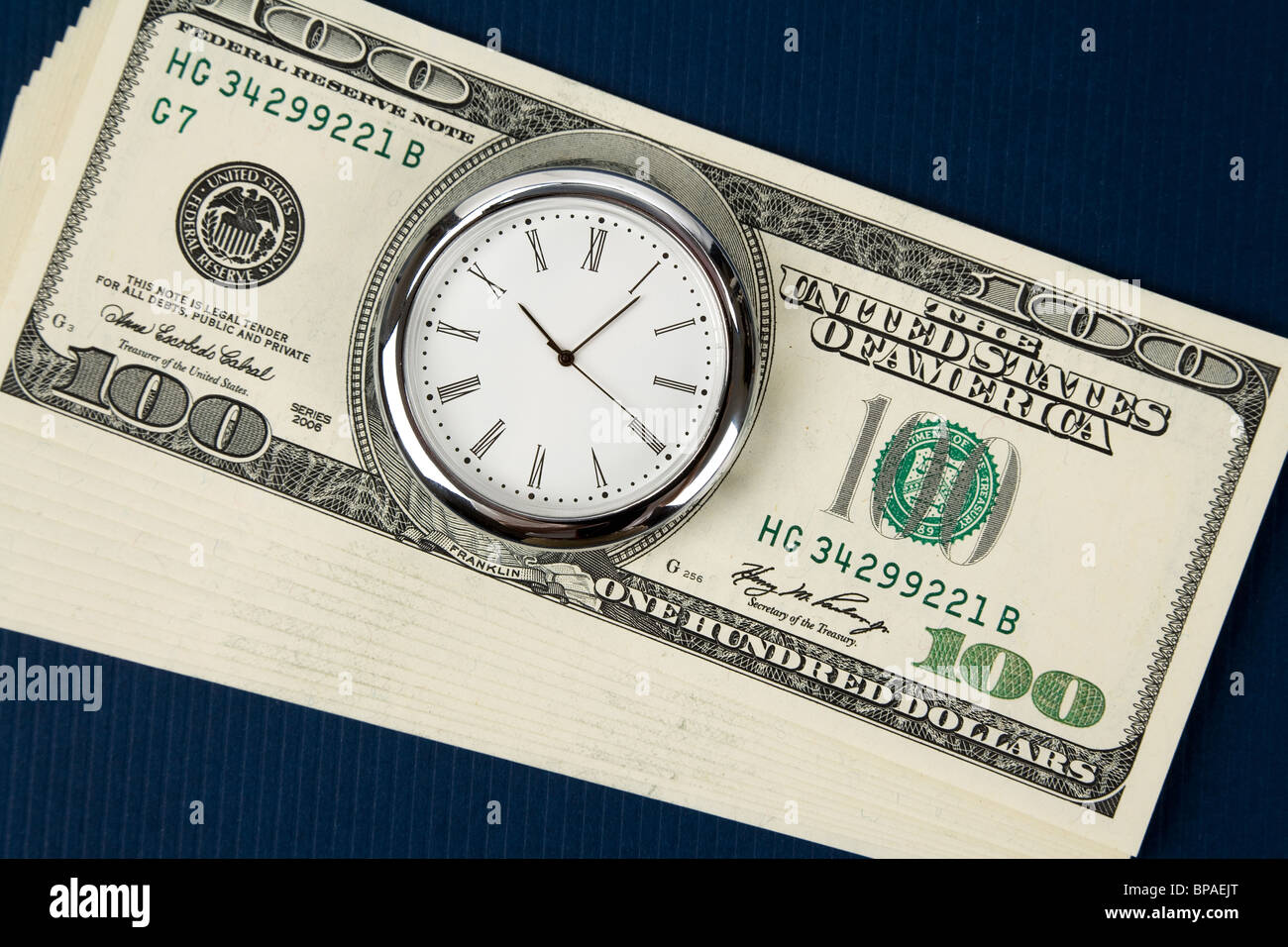 Time is Money, dollar and clock Stock Photo
