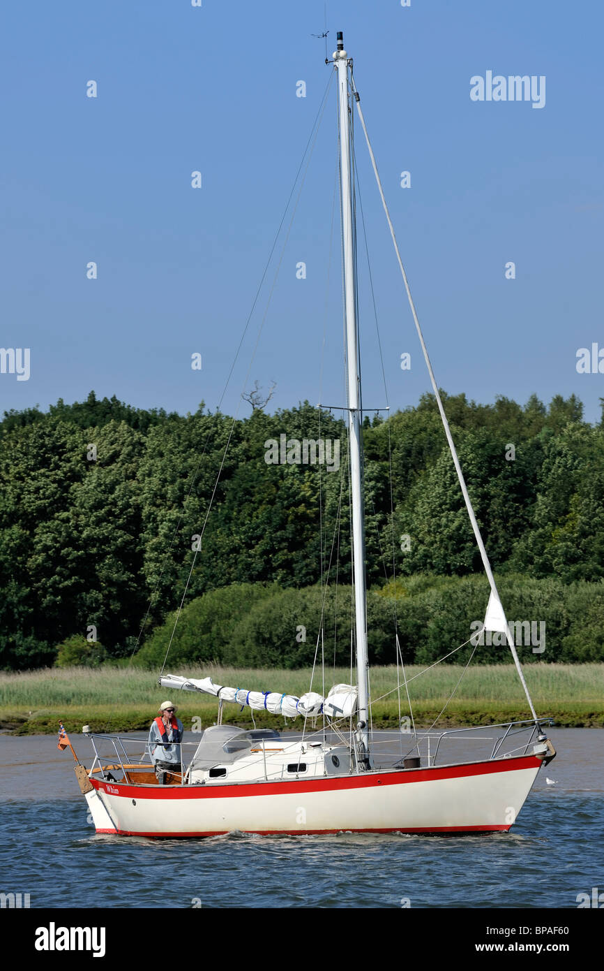 Sailing boat on the estuary Stock Photo