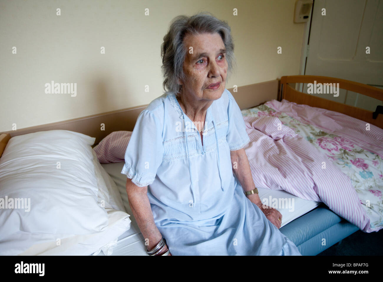 Elderly woman in a care home Stock Photo