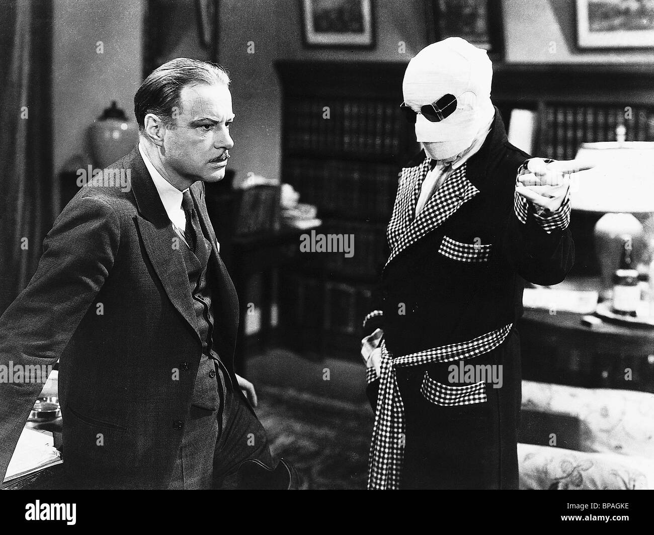 WILLIAM HARRIGAN, CLAUDE RAINS, THE INVISIBLE MAN, 1933 Stock Photo