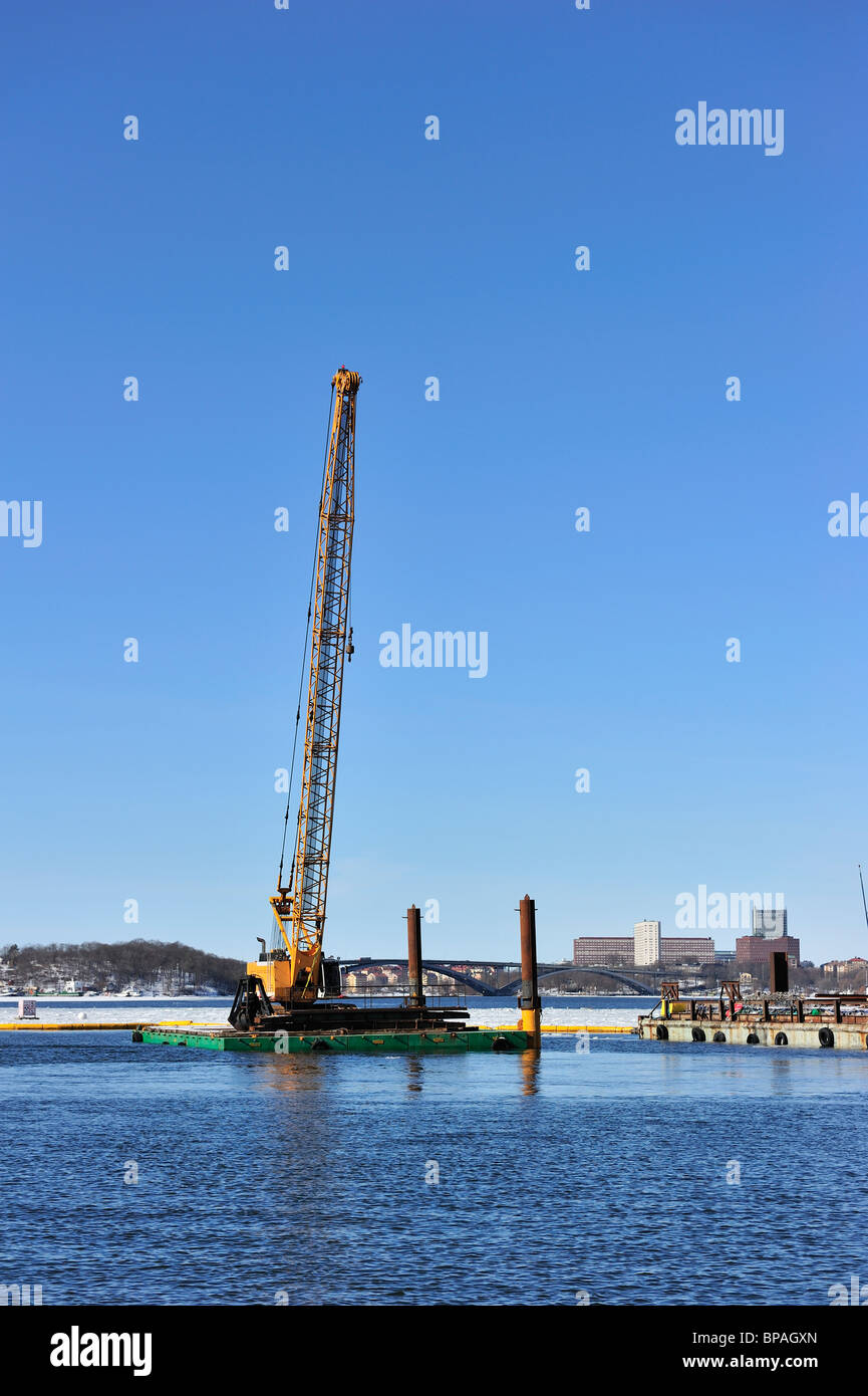 Floating crane work on a lake Stock Photo Alamy