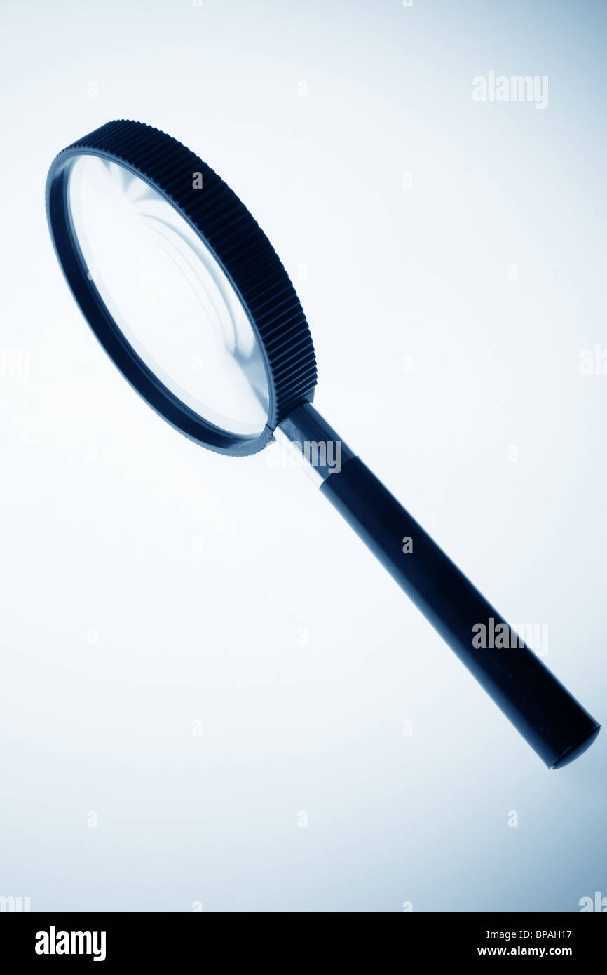 magnifier close up in blue tone Stock Photo