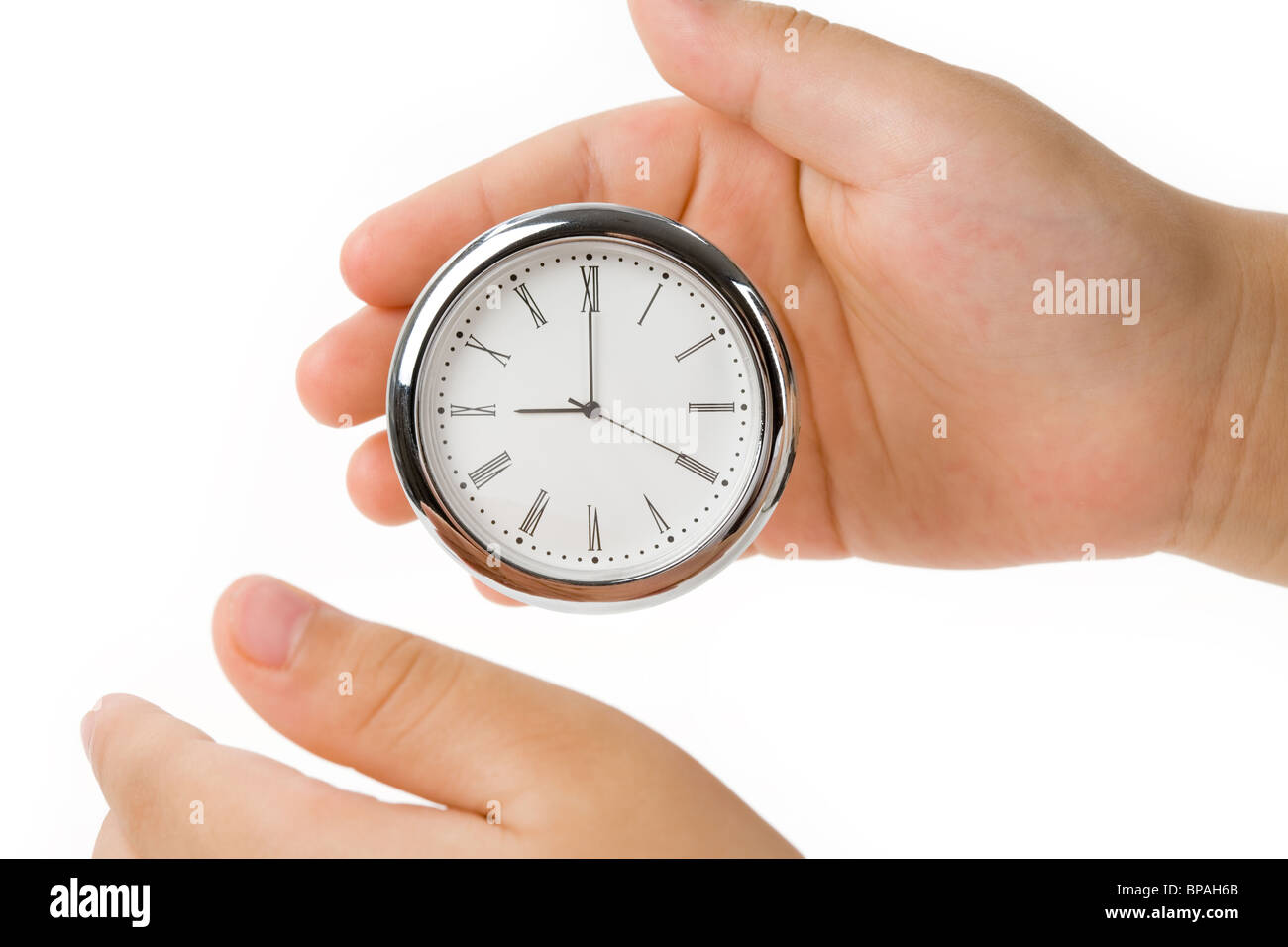 Clock face and finger, concept of Time Control and Balance Stock Photo