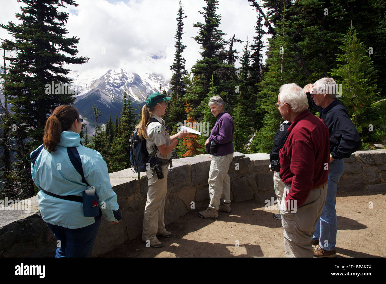 A young ranger naturalist describes the geology of Mount Rainier. Sunrise area Stock Photo