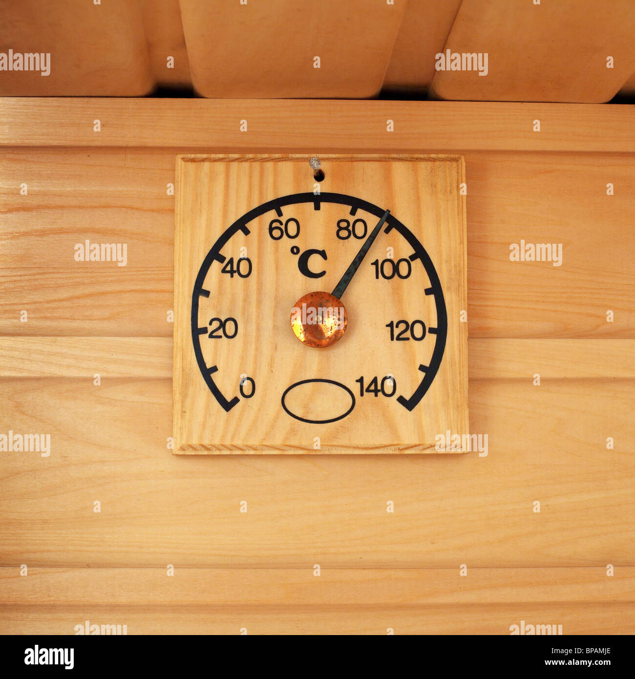 The wooden thermometer showing temperature in a sauna Stock Photo - Alamy