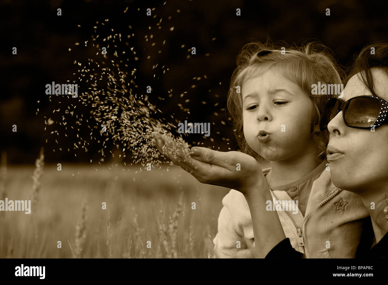 mum and daughter having fun in the park Stock Photo Alamy