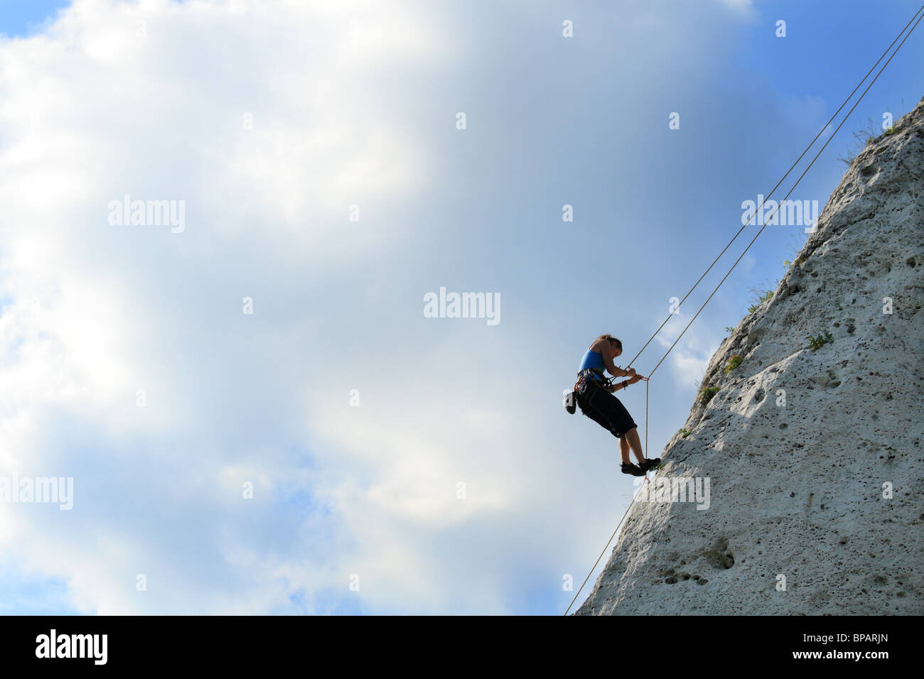 Woman rappelling on limestone rock. Jura, Poland Stock Photo - Alamy