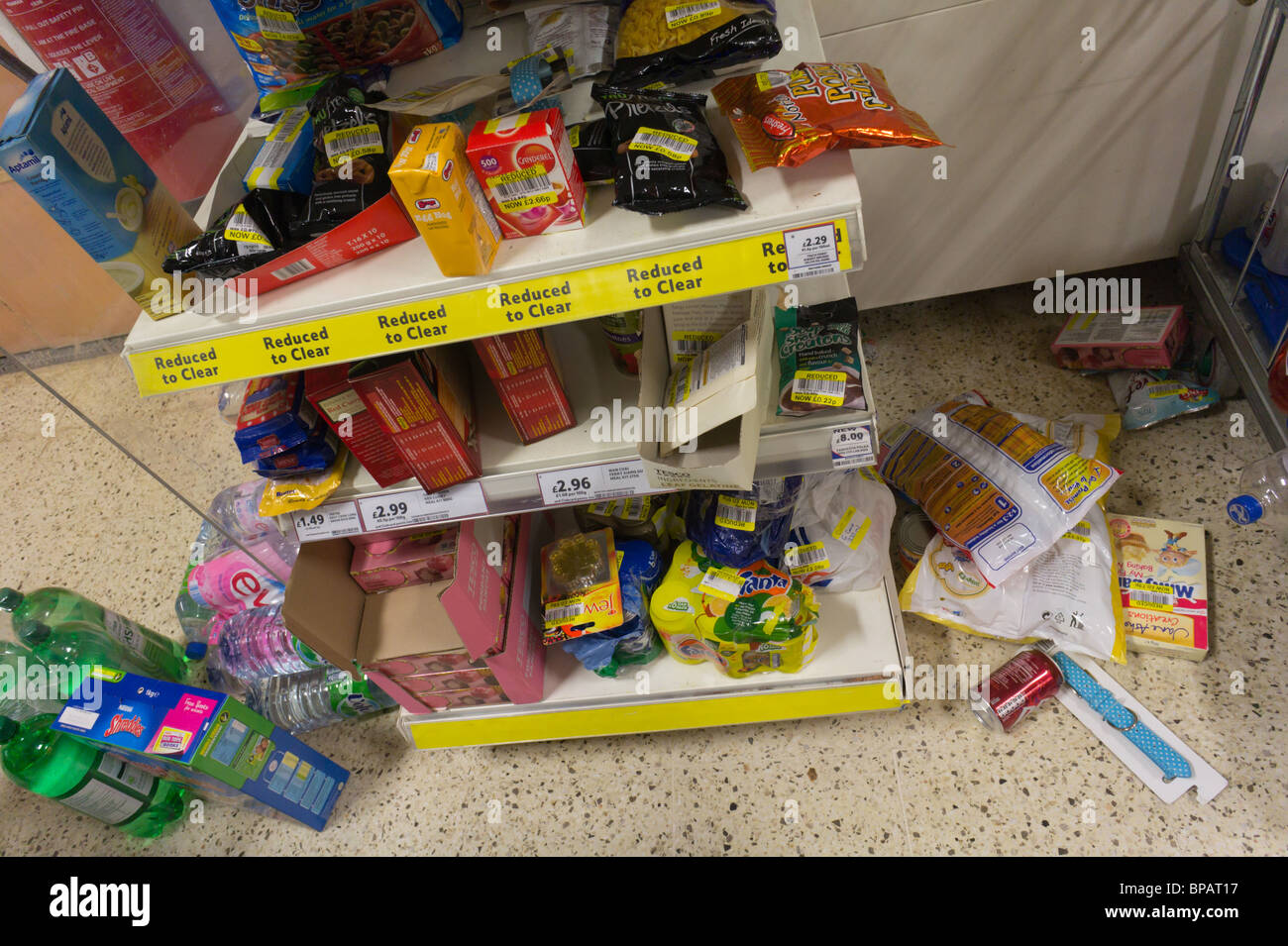 Supermarket 'dumps' shelves - short date or damaged packaging cut price sale Stock Photo