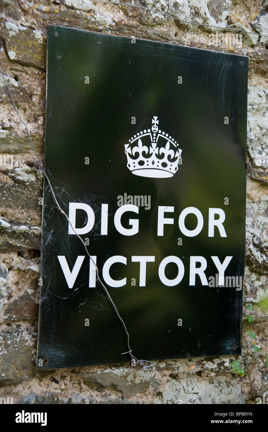 Dig For Victory Sign On A Garden Wall Stock Photo - Alamy