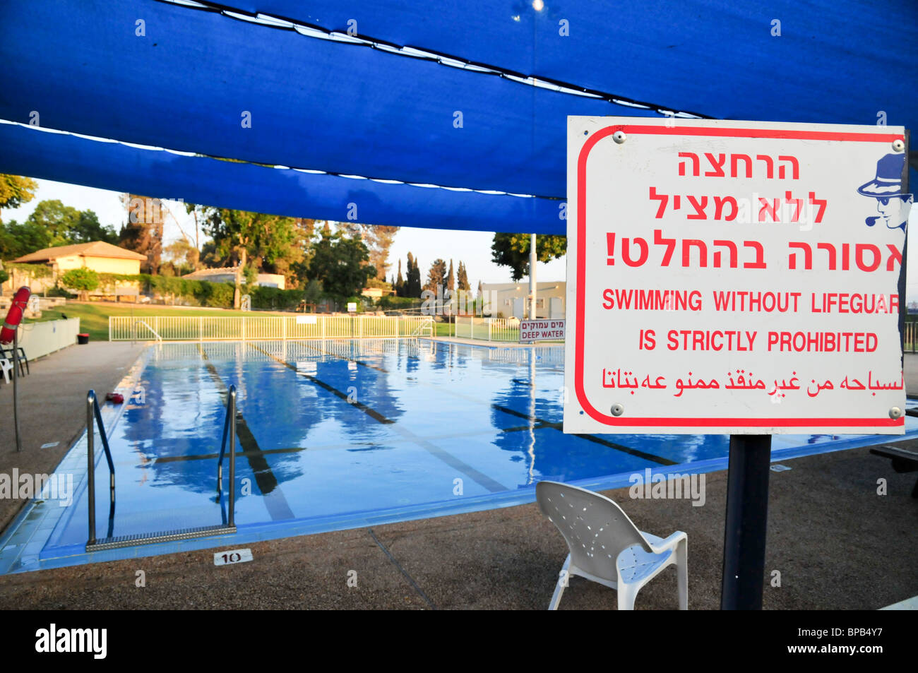 Outdoor Swimming pool warning sign Stock Photo