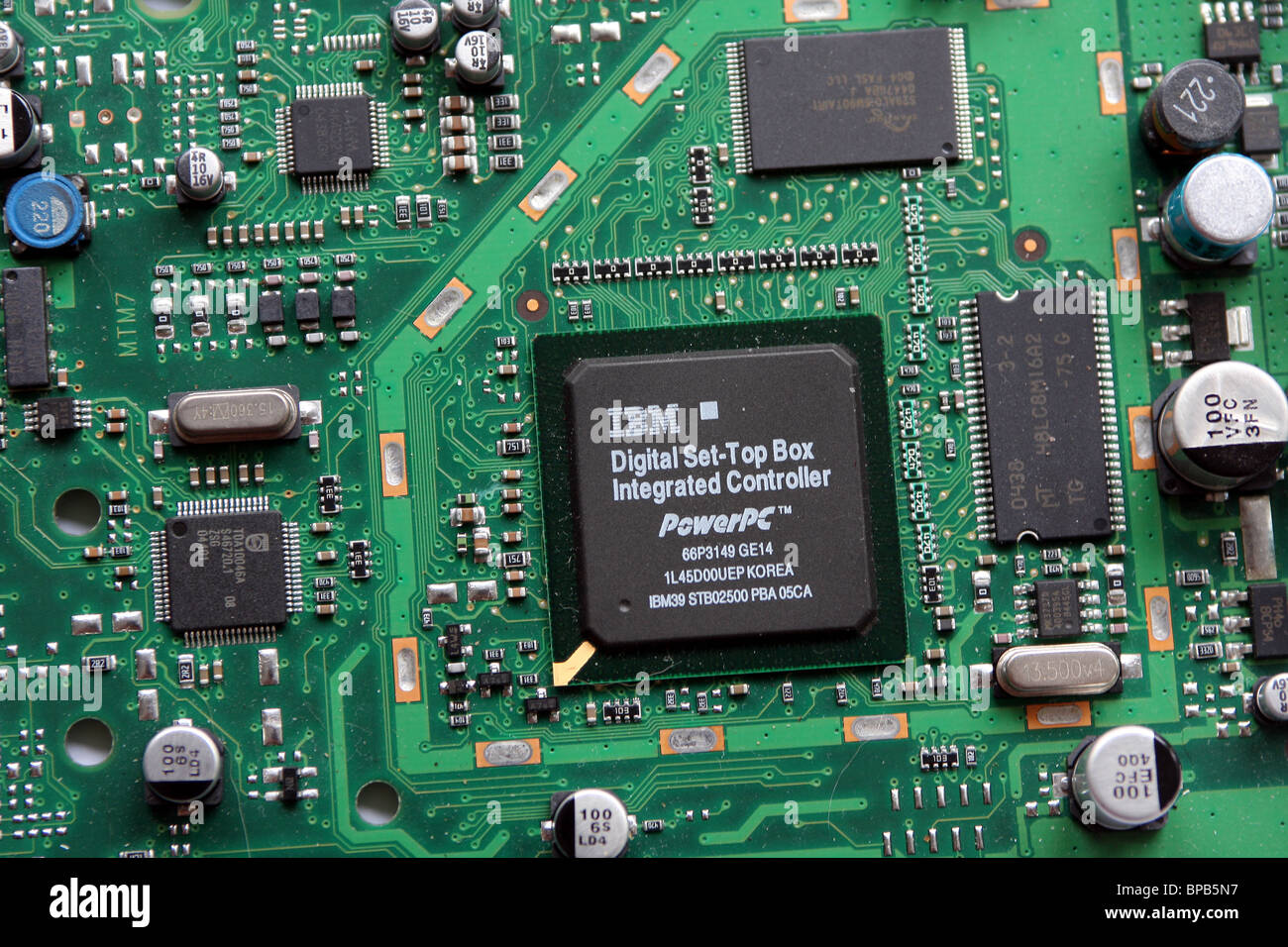 Printed Circuit Board of a DVB digital Television receiver box made by Sagem to receive free to air terrestrial tv programs Stock Photo