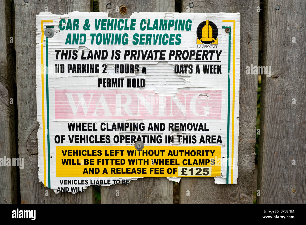 Car and vehicle clamping and towing notice in private property on a