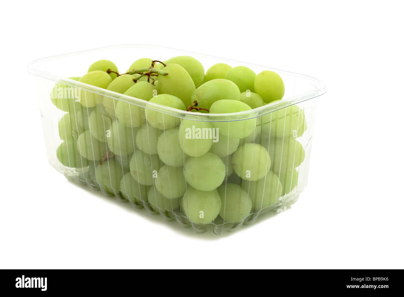 Plastic punnet of white grapes seedless Stock Photo - Alamy