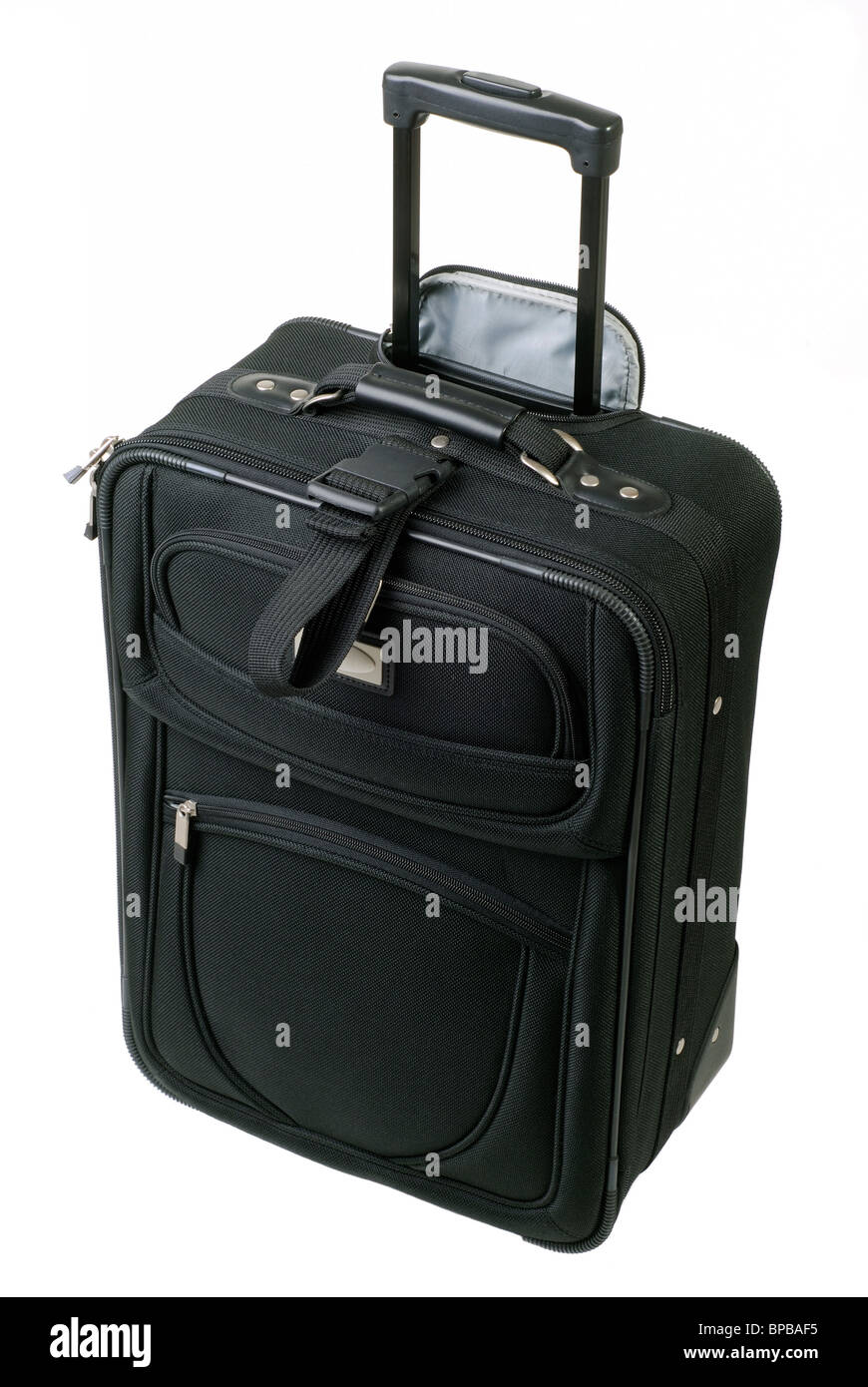 Small Black Carry On Baggage For Air Travel With Wheels And A Folding Handle Stock Photo