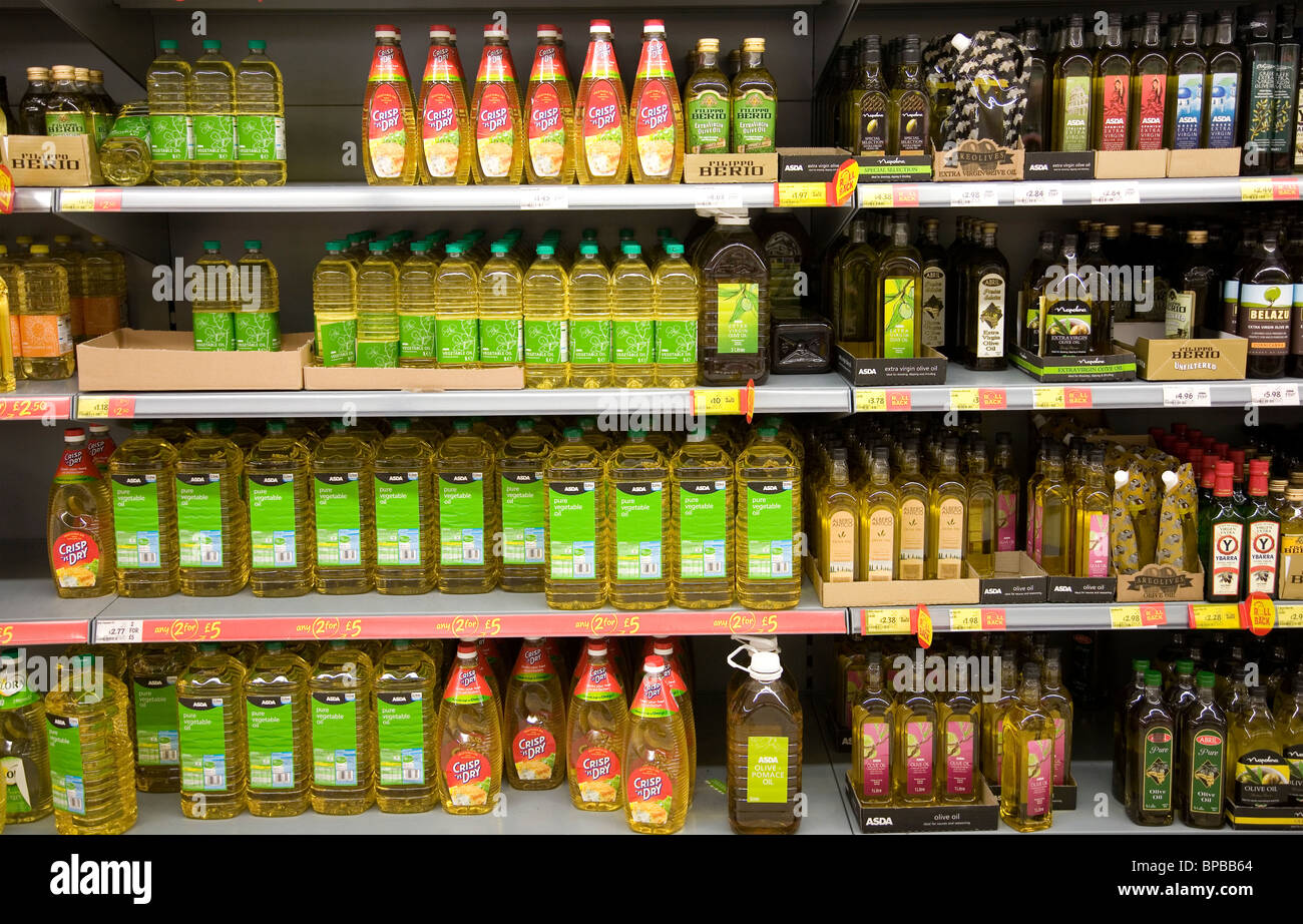 Assorted Oils on Shelf at Asda Supermarket London UK Stock Photo