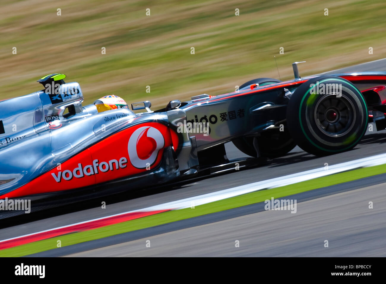 Lewis Hamilton close up at speed in the  2010 MP4-25 Vodafone Stock Photo