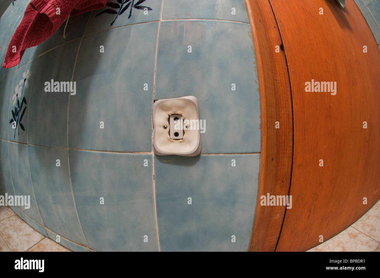 Electric wall outlet in dangerous melting process due to overheating