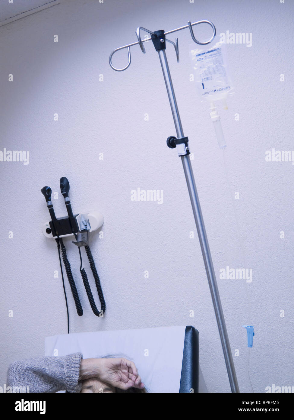 torremolinos, malaga, andalusia, spain; outpatient in a clinic emergency room receiving antibiotic intravenous drip Stock Photo