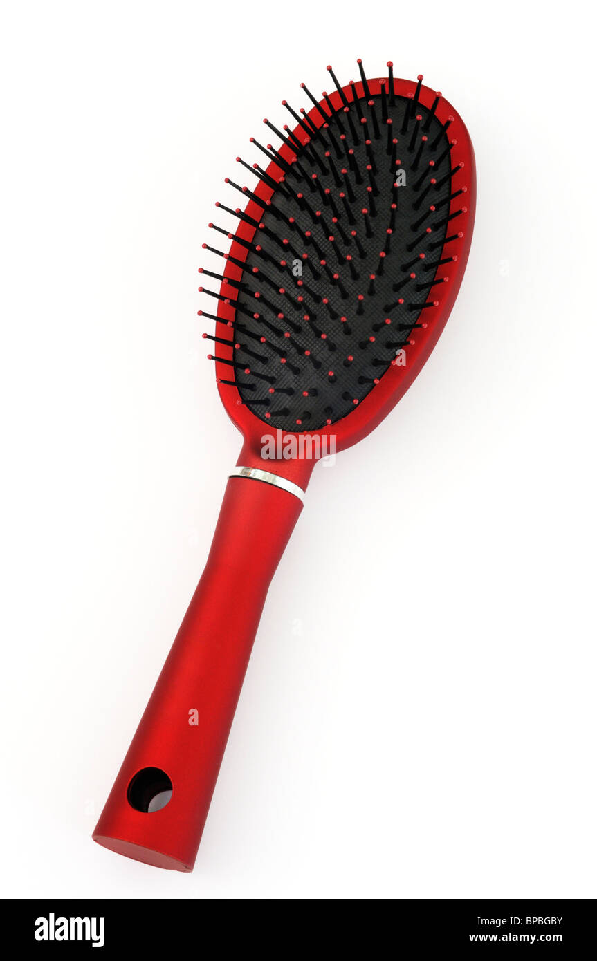 Red hair brush on white background Stock Photo
