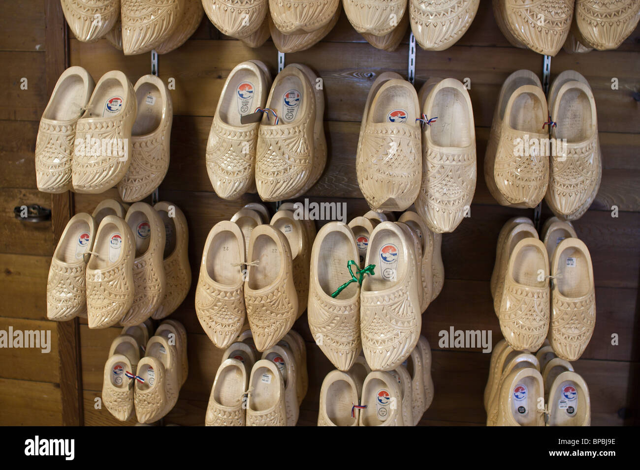 Tulip time festival Holland Michigan in USA  Traditional Dutch wooden shoes clogs klomp klompen sale stand  nobody  none full frame background hi-res Stock Photo
