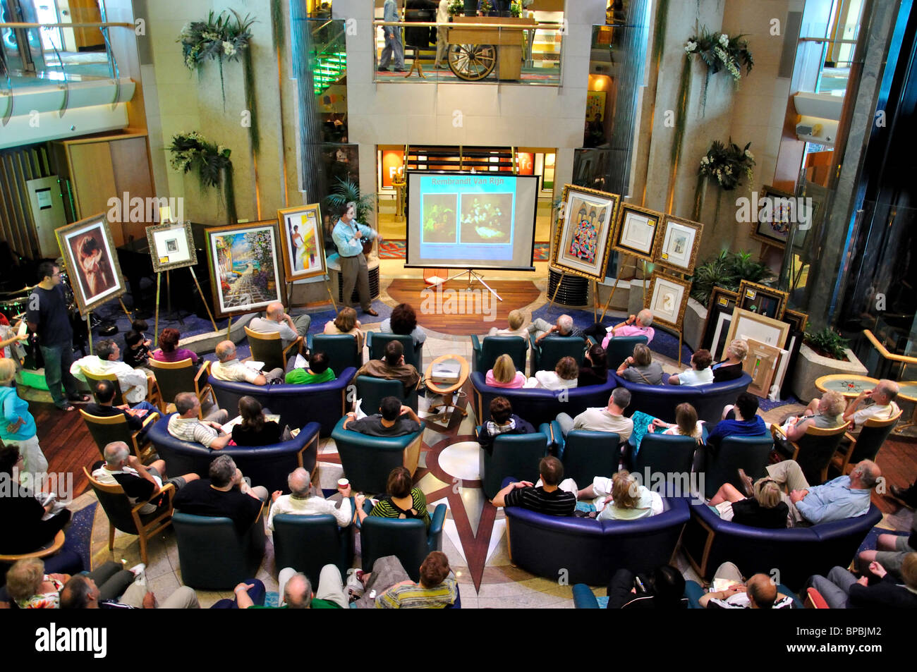 Art auction in The Centrum, The MS 'Jewel of the Seas' Royal Caribbean International cruise ship, North Sea, Europe Stock Photo