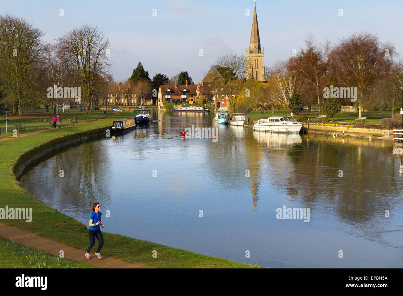 Jogging by the Thames at Abingdon Stock Photo