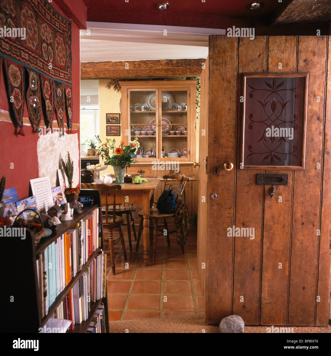 Engraved Glass Panel In Open Front Door Of Cottage Hall With