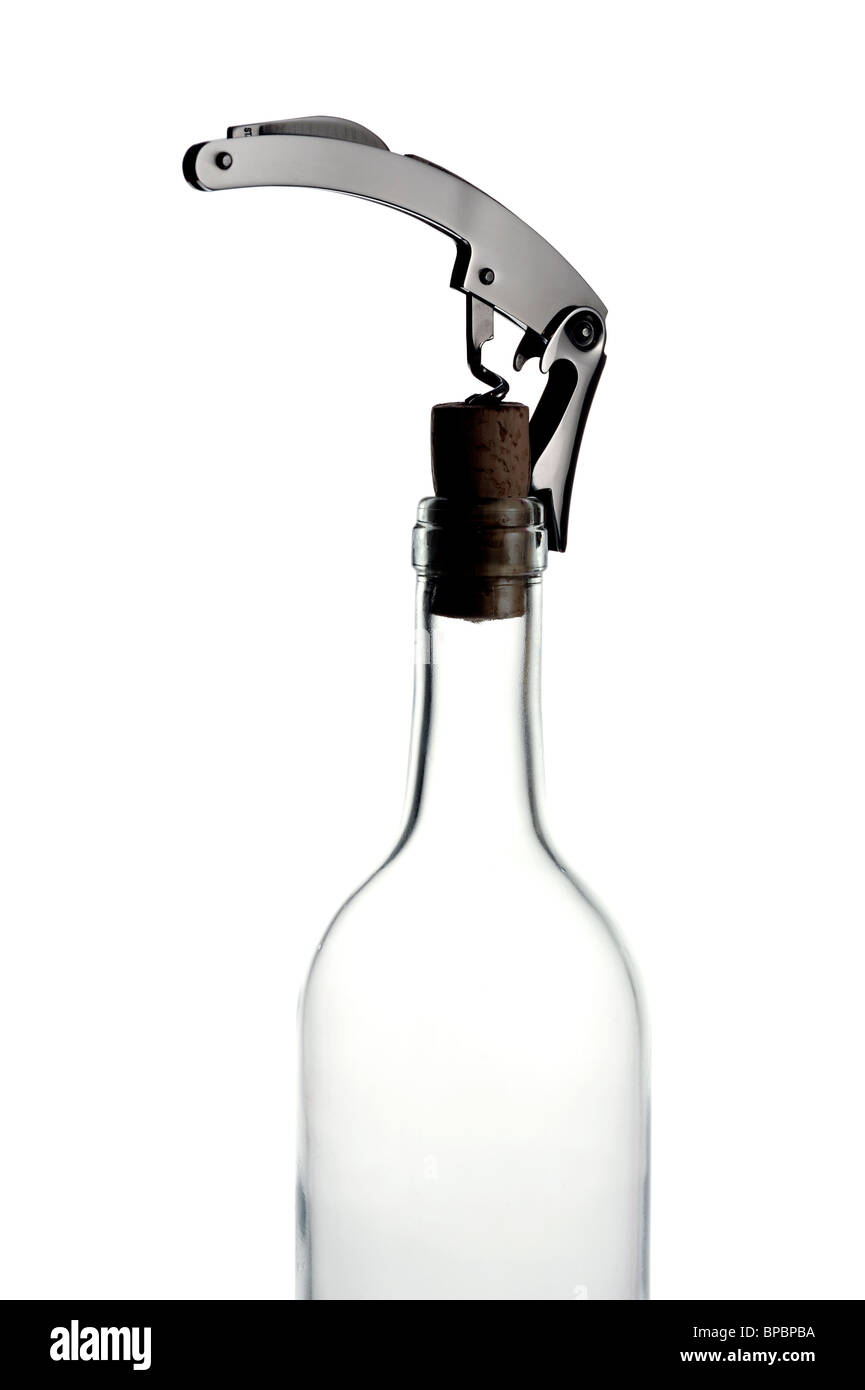 Corkscrew and wine bottle Stock Photo