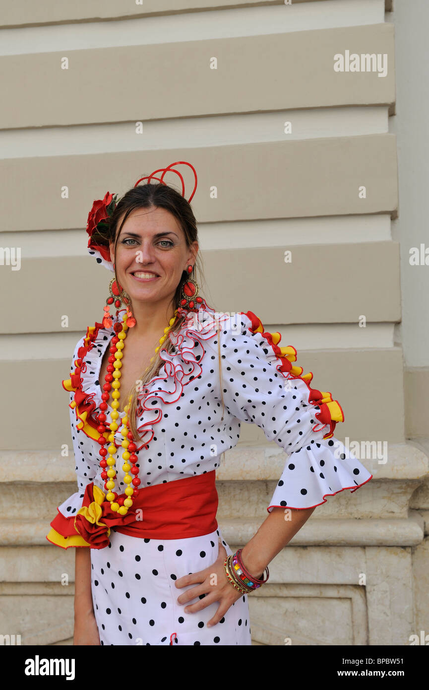 Lady in traditional Spanish dress Malaga Feria Malaga fair  Spain Spanish fiesta Stock Photo