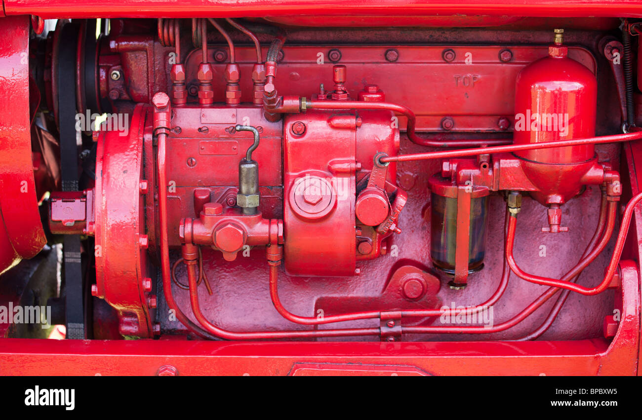 Old vintage tractor engine with solid red engineering Stock Photo Alamy