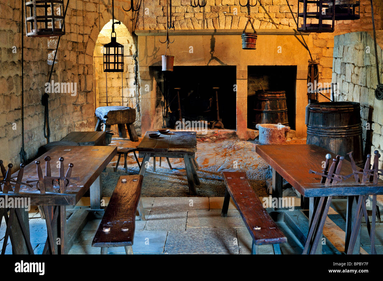 France: Medieval dining room and kitchen in the Chateau de Beynac Stock Photo