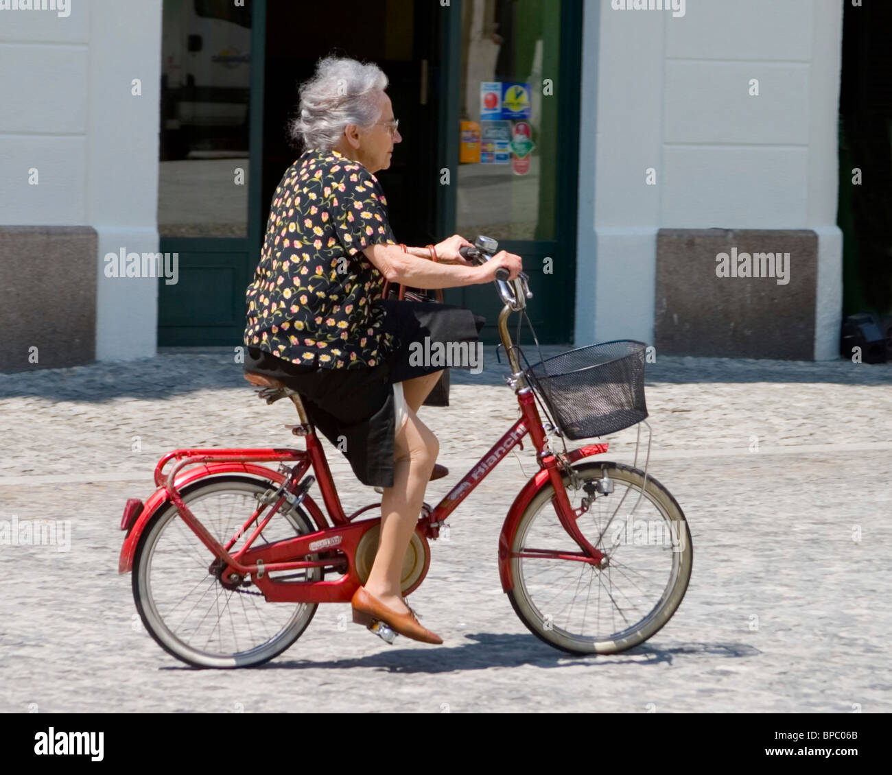 old lady on bike