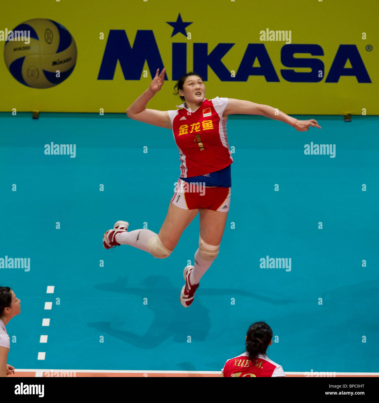 China's Wang Yimei spikes the ball against USA during their volleyball