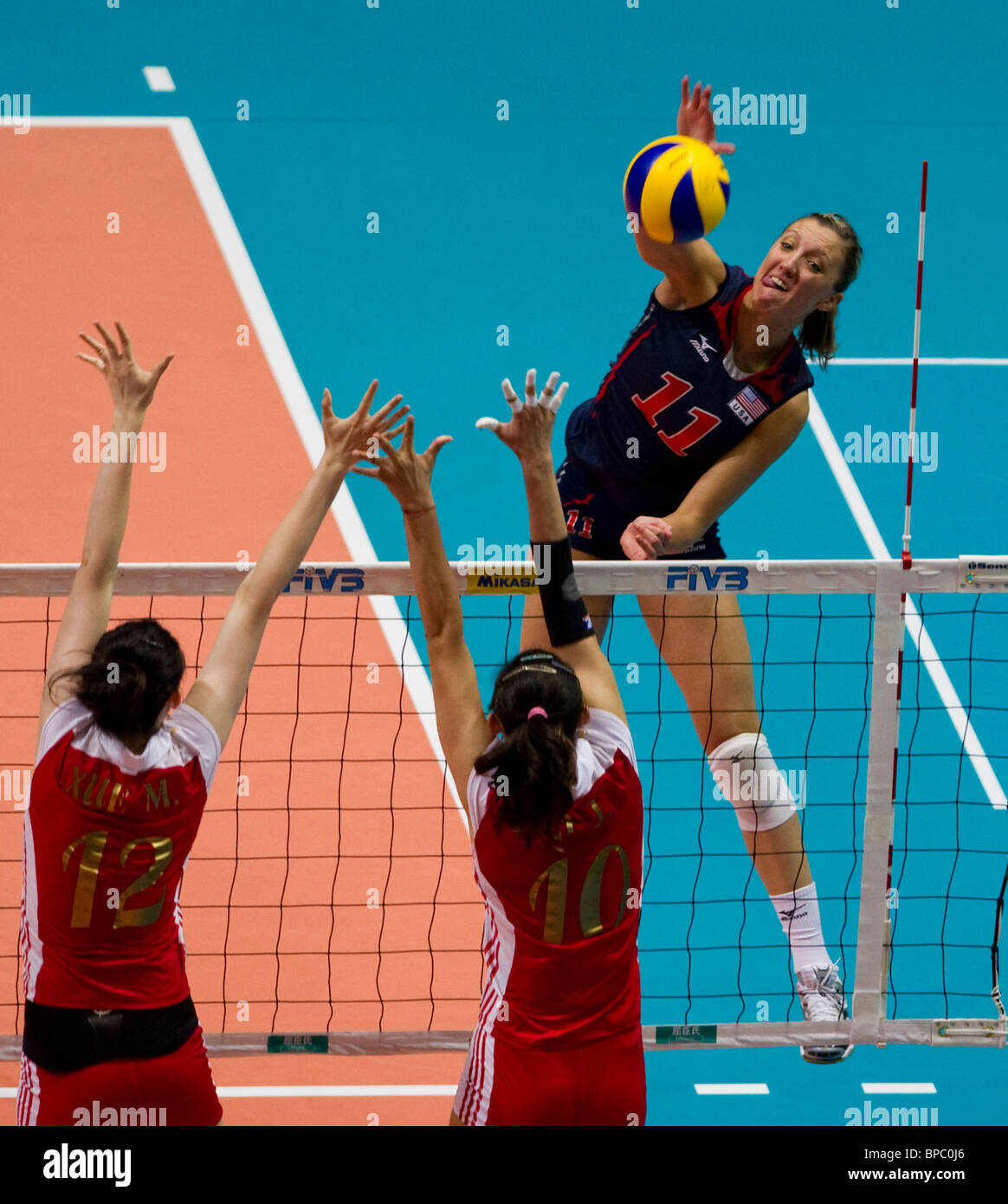 Jordan Larson Of The Usa Spikes The Ball Against China During Their Volleyball Game Stock Photo Alamy